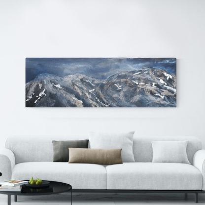 A large abstract landscape painting showing a mountain landscape in shades of navy inky blue, beige, gold,cream and white. Inspired by the the SNowy Mountains