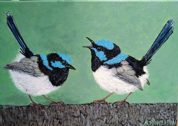 2 Blue wrens on a branch with muted green background 
