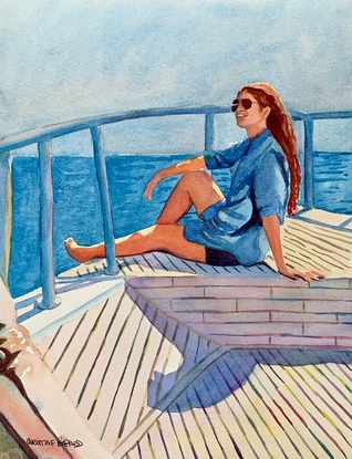 Woman sits on the decking.