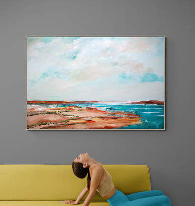 Abstract seascape in fresh teal green tones with mountain range in the horizon under a dramatic cloudy sky.