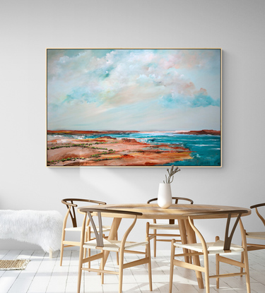 Abstract seascape in fresh teal green tones with mountain range in the horizon under a dramatic cloudy sky.