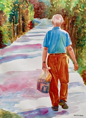 Man walks along path.