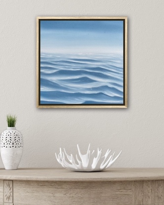 Ocean ripples under a big blue sky