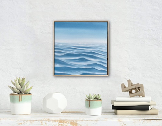 Ocean ripples under a big blue sky