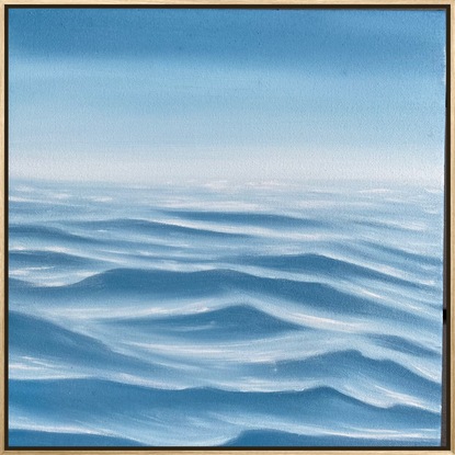 Ocean ripples under a big blue sky