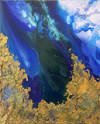 Aerial view of ocean with textured gold.