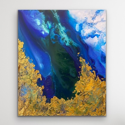 Aerial view of ocean with textured gold.