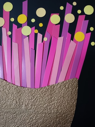 Close up look of a pink gum blossom. Created with hand cut recycled cardboard packaging and reimagined into an artwork 