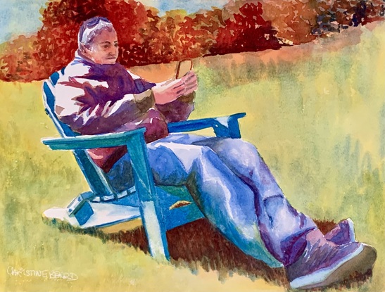 Man sits in a park.