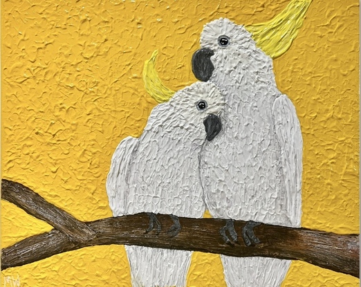 White cockatoo couple on bright yellow background