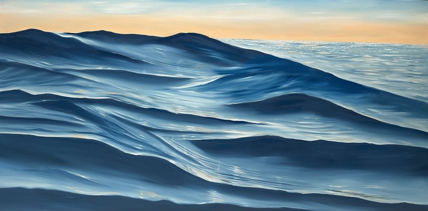 Ocean swell with a vantage point of swimming at sunrise