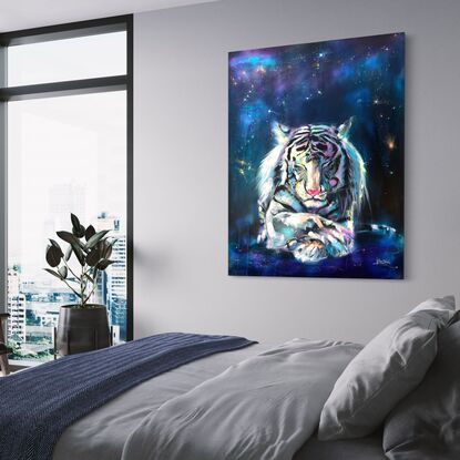 White Tiger lying crossed legs with closed eyes on cosmic background