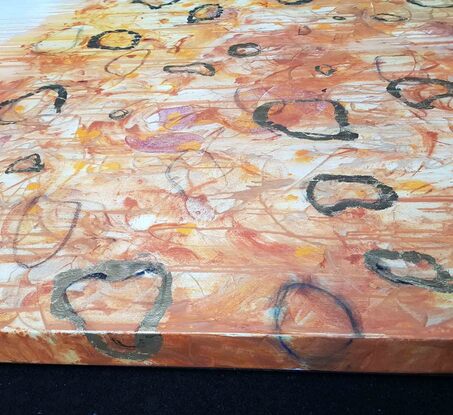 a large abstract landscape in ochre, terracotta, beige and brown with copper leaf