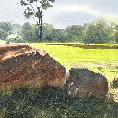 A landscape with 3 large rocks and their shadows in the foreground and trees in the distance.