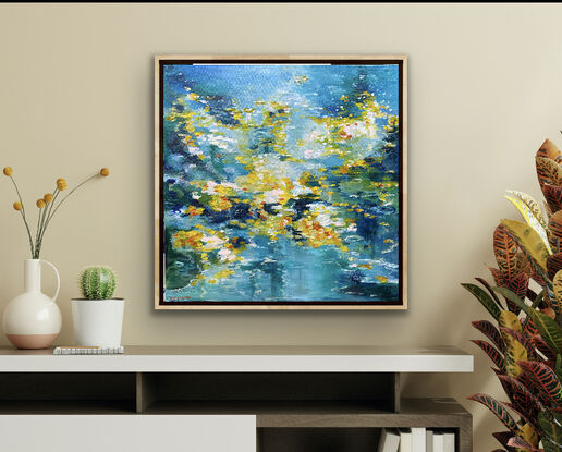 Soft dreamy blues and dashes of yellow and orange abstract flowers that dance over the water on this canvas to create a dreamy watery world. You can feel the power of nature through the colour and the brushstrokes that tell a story of a colourful water garden spilling over with life and vibrancy. 