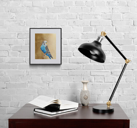 Blue budgerigar perched on gold background