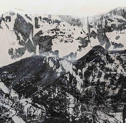 A black and white abstract landscape of moountains