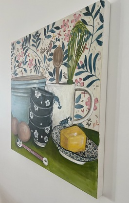 Still Life - Kitchen Scene. Mixing Bowl, Japanese blue bowls, Lobster jug, Japanese spoon, Tea towel, Eggs whisk, Wooden spoon, Butter on a plate.