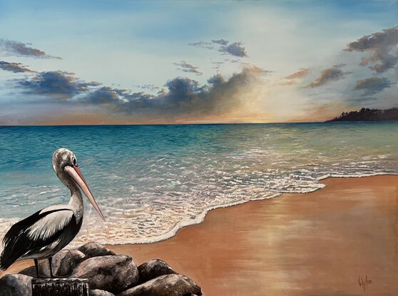 A pelican gracefully perches on a cluster of rocks, overlooking a stunning beach during a radiant sunset. Inviting viewers to pause and reflect, embracing the beauty of nature and finding solace in its tranquil moments.