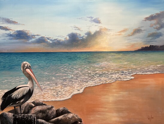 A pelican gracefully perches on a cluster of rocks, overlooking a stunning beach during a radiant sunset. Inviting viewers to pause and reflect, embracing the beauty of nature and finding solace in its tranquil moments.