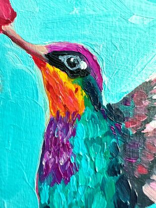 Small painting of a colourful Hummingbird.