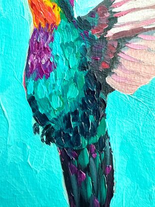 Small painting of a colourful Hummingbird.