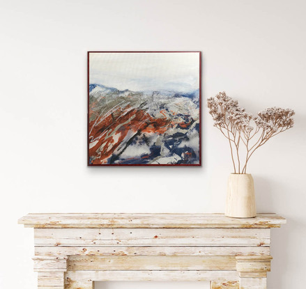 A large abstract painting of the Australian outback in earth colours, rust, brown ,navy blue and silver