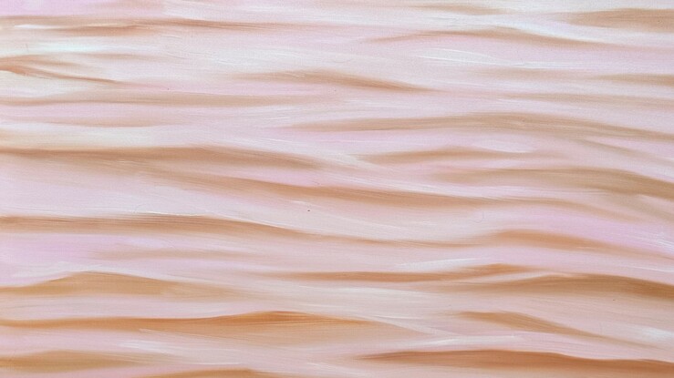 Ripples on water surface in blush pink and brown. Realistic with an abstract feel