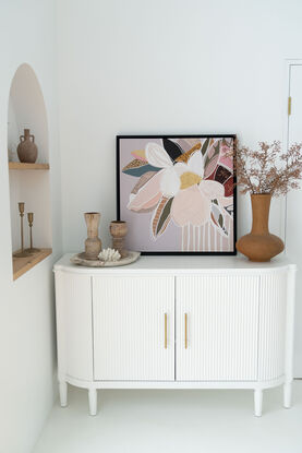 A modern, abstract floral framed canvas print.