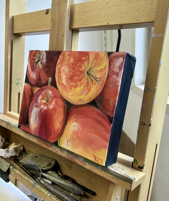 Close up of red apples on a dark background 