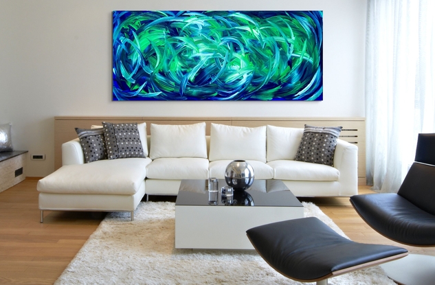 Photo shows painting in two different lounge rooms.