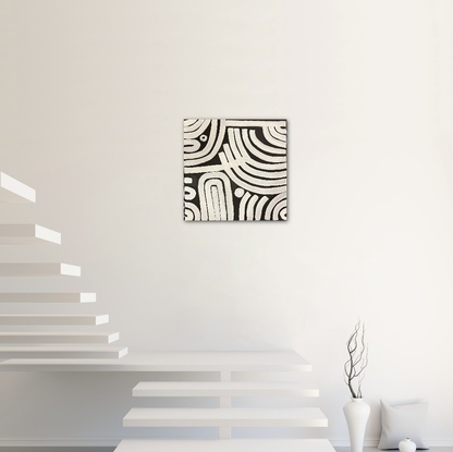 This striking abstract work plays on the imagery of a zebra's distinctive black and white stripes. Against a deep black background, bold white stripes crisscross the canvas with energy that evokes the untamed spirit of the African savannah. Each stripe creates a sense of movement and rhythm as they eave and converge across the surface. The contrast between light and dark imbues the painting with a sense of drama and dynamism, whilst highlighting the innate beauty of simplicity and symmetry.