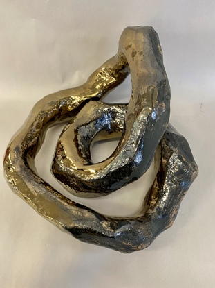 Abstract sculpture, Infinite energy, golden ring 