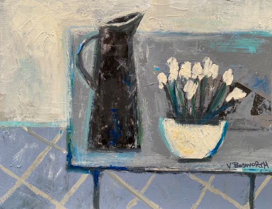 A black jug and bowl of white flowers on a grey table .  The space is flattened and the background consists of creams, and blue greys.