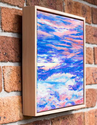 Layered colourful clouds cover the canvas with bright blue and purple tones and the occasional pop of orangey pink.