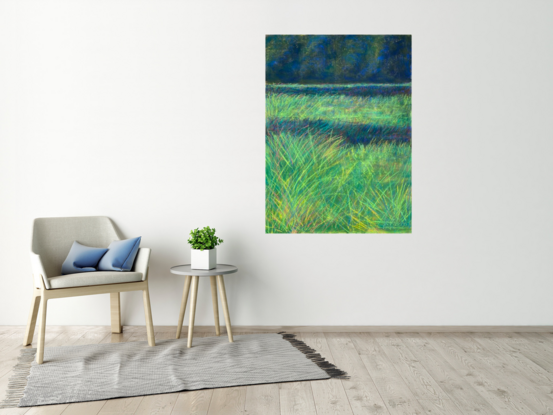 soft pastel afternoon image of a field of grass with trees in background 