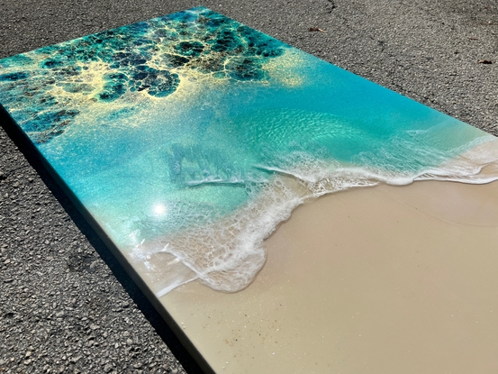 aerial ocean waves and white sandy beach