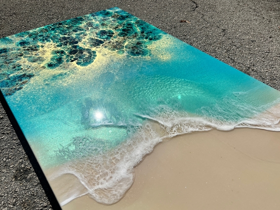 aerial ocean waves and white sandy beach