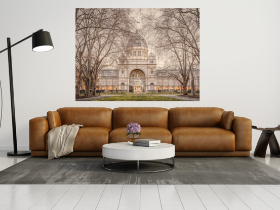 Winter photograph of the Royal Exhibition Building at Carlton Gardens featuring bare trees, central fountain and grunge effect captured by the photographer.