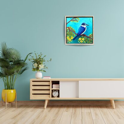 An oil painting of a blue Kingfisher bird amongst yellow Jacaranda flowers.