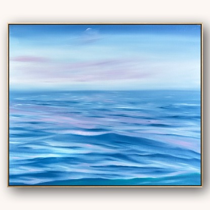 Ocean ripples looking under a pink and blue sky