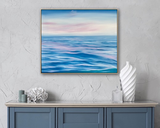 Ocean ripples looking under a pink and blue sky