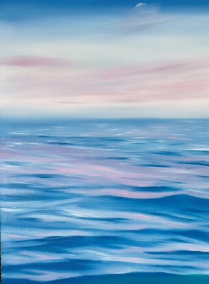 Ocean ripples looking under a pink and blue sky