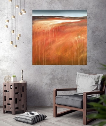 A square abstract landscape in shades of red,red gold and white dripping paint featuring a small mountainscape at the top under a blue and cloudy sky.