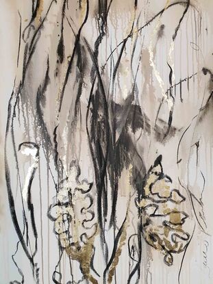 A large abstract landscape of grass and flowers in the outback in brown, beige and black with gold leaf.