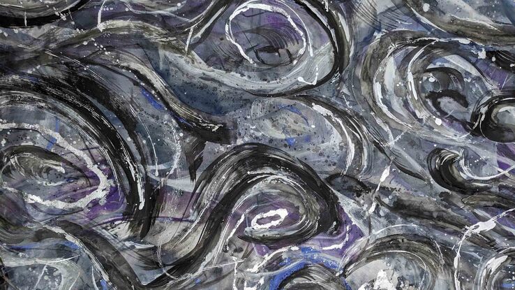 An abstract of water ripples and waves with metallic silver leaf