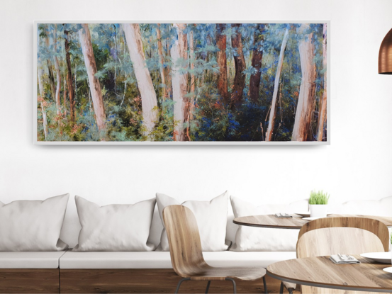 Extra large, long narrow landscape painting by Victoria Collins, showing middle-storey of a sapling forest with layers of delicate marks from very dark olive green to pale teal and apricot tones.