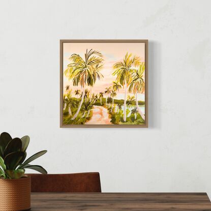 A painting of the morning sky with palm trees and a path. 