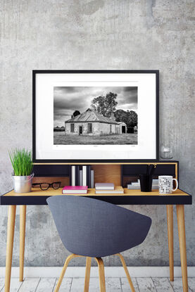 abandoned pioneers hut in rural farm setting