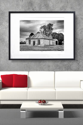 abandoned pioneers hut in rural farm setting